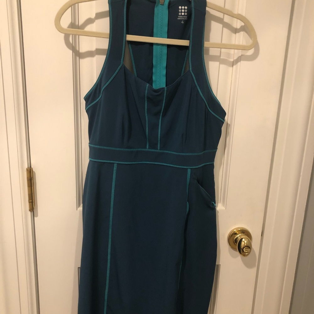 Title Nine sport to dinner dress with side zip pocket. Bluish/green color